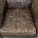 Very comfortable vintage cow leather armchair with beautiful colours