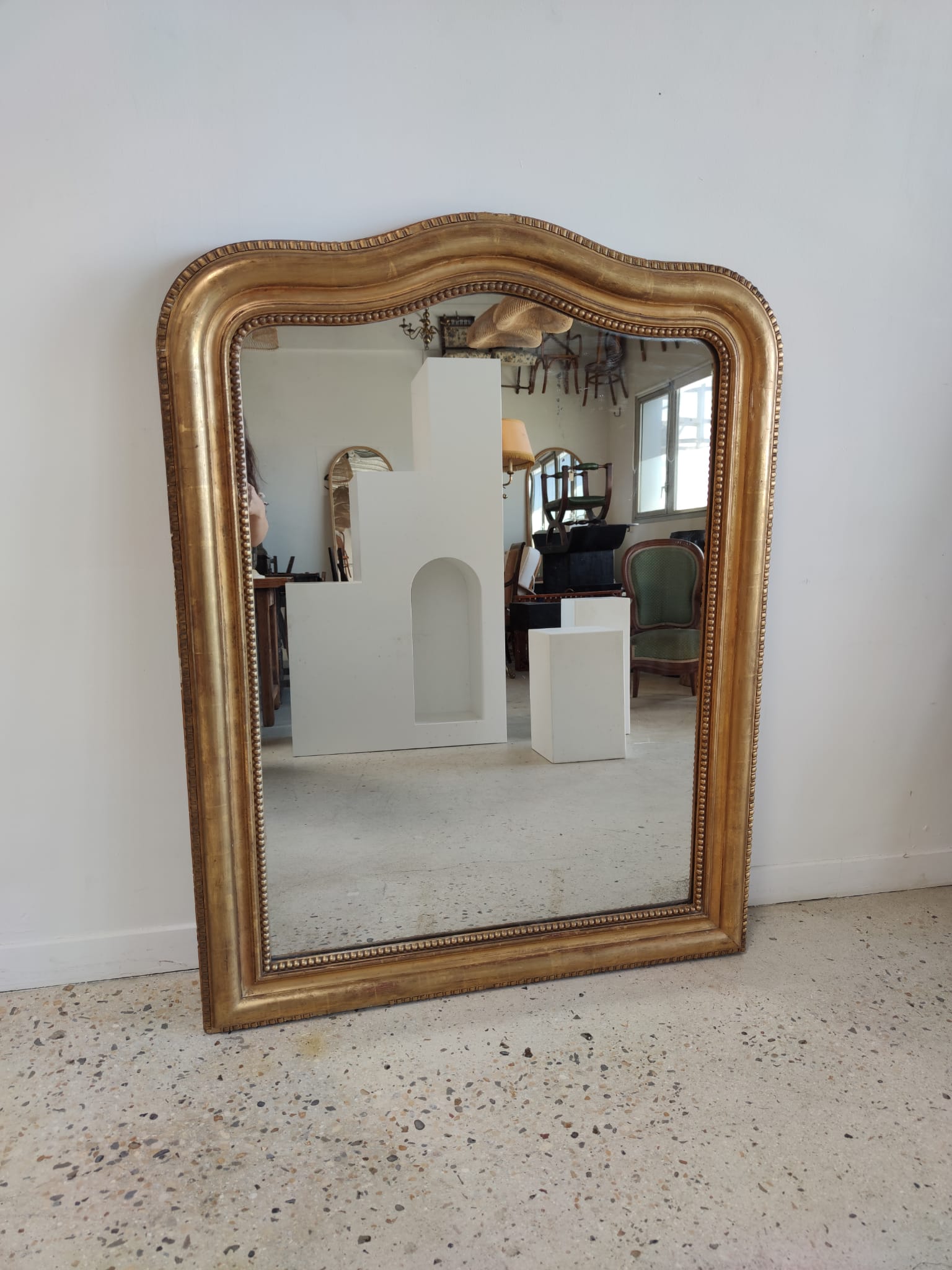 Louis Philippe gilded mirror with gendarme hat nineteenth H:130cm