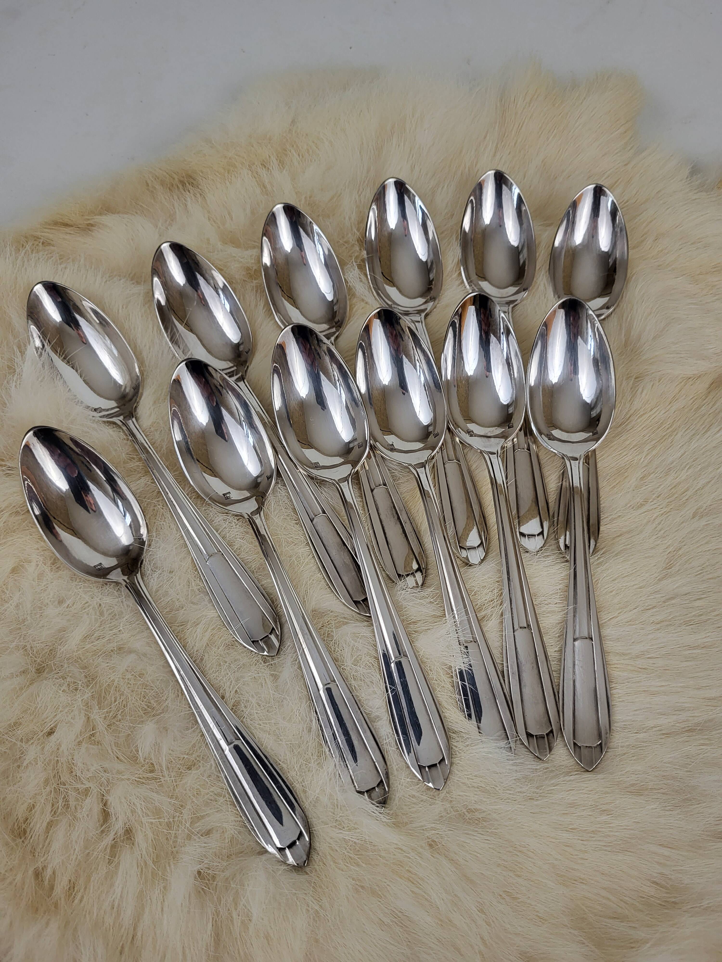 12 silver-plated metal teaspoons, Art Deco style