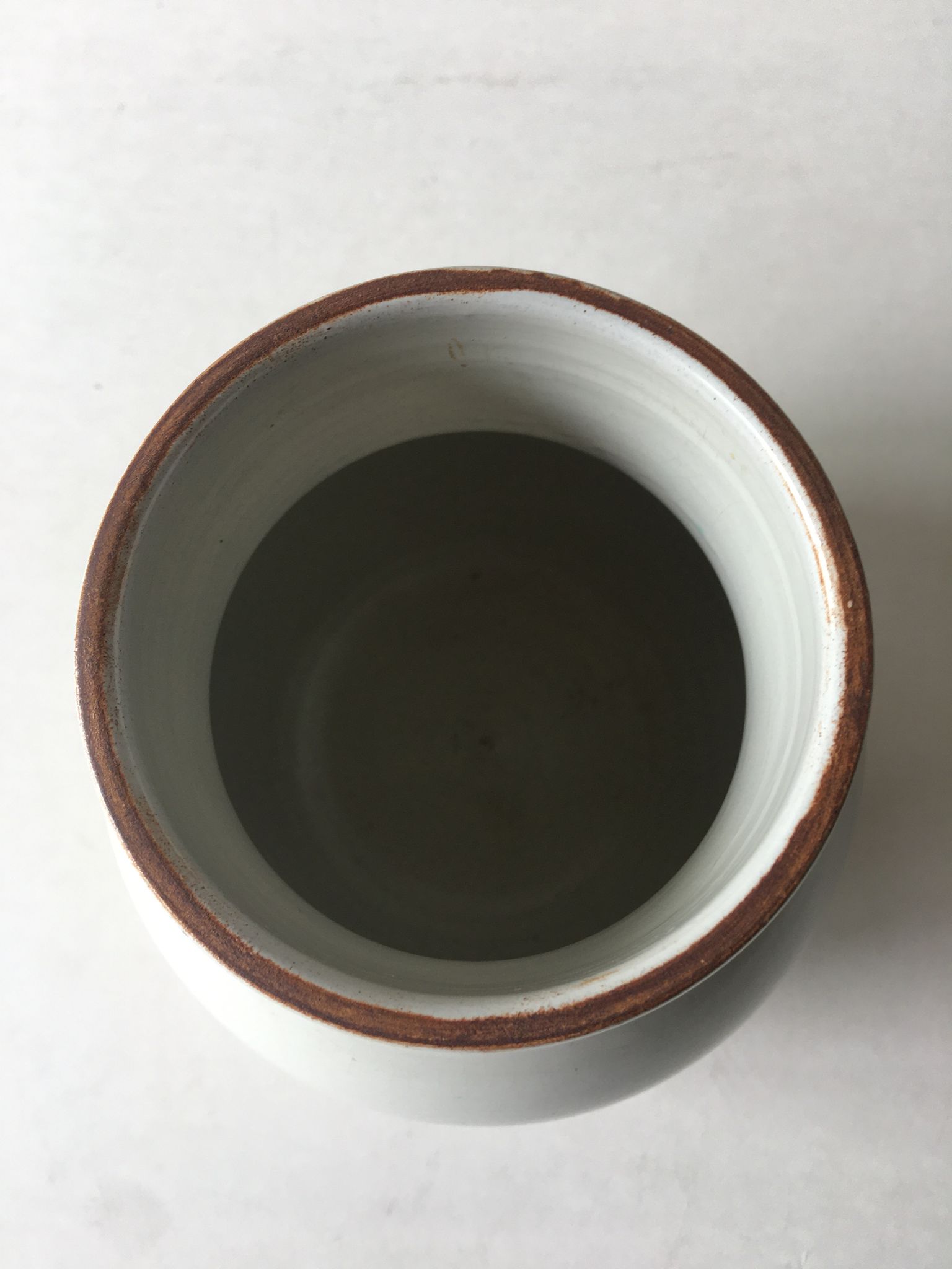 Cracked vintage earthenware vase