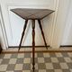 Old tripod side table