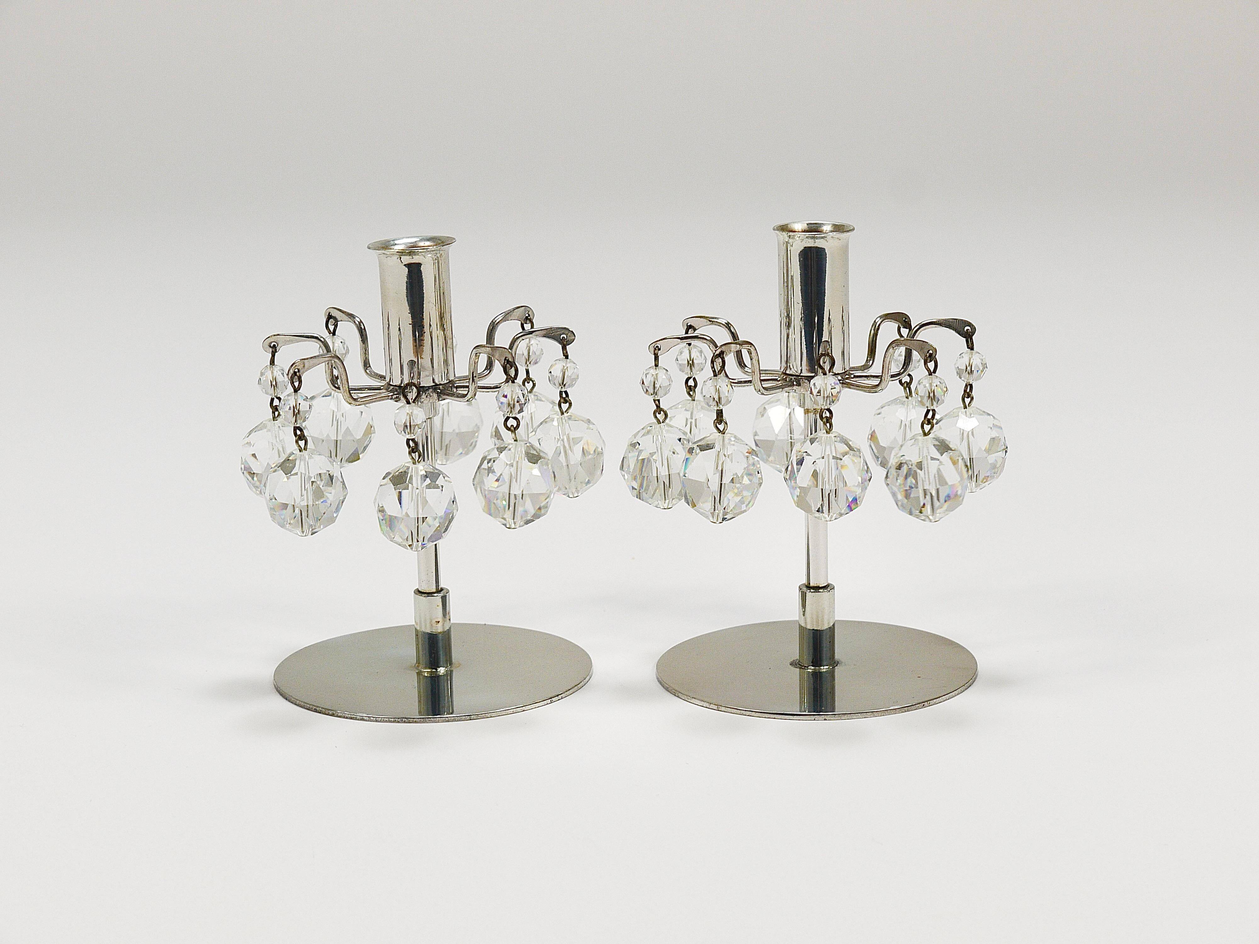 Pair of candlesticks "Lights of Vienna" J.L. Lobmeyr, faceted Swarovski crystals