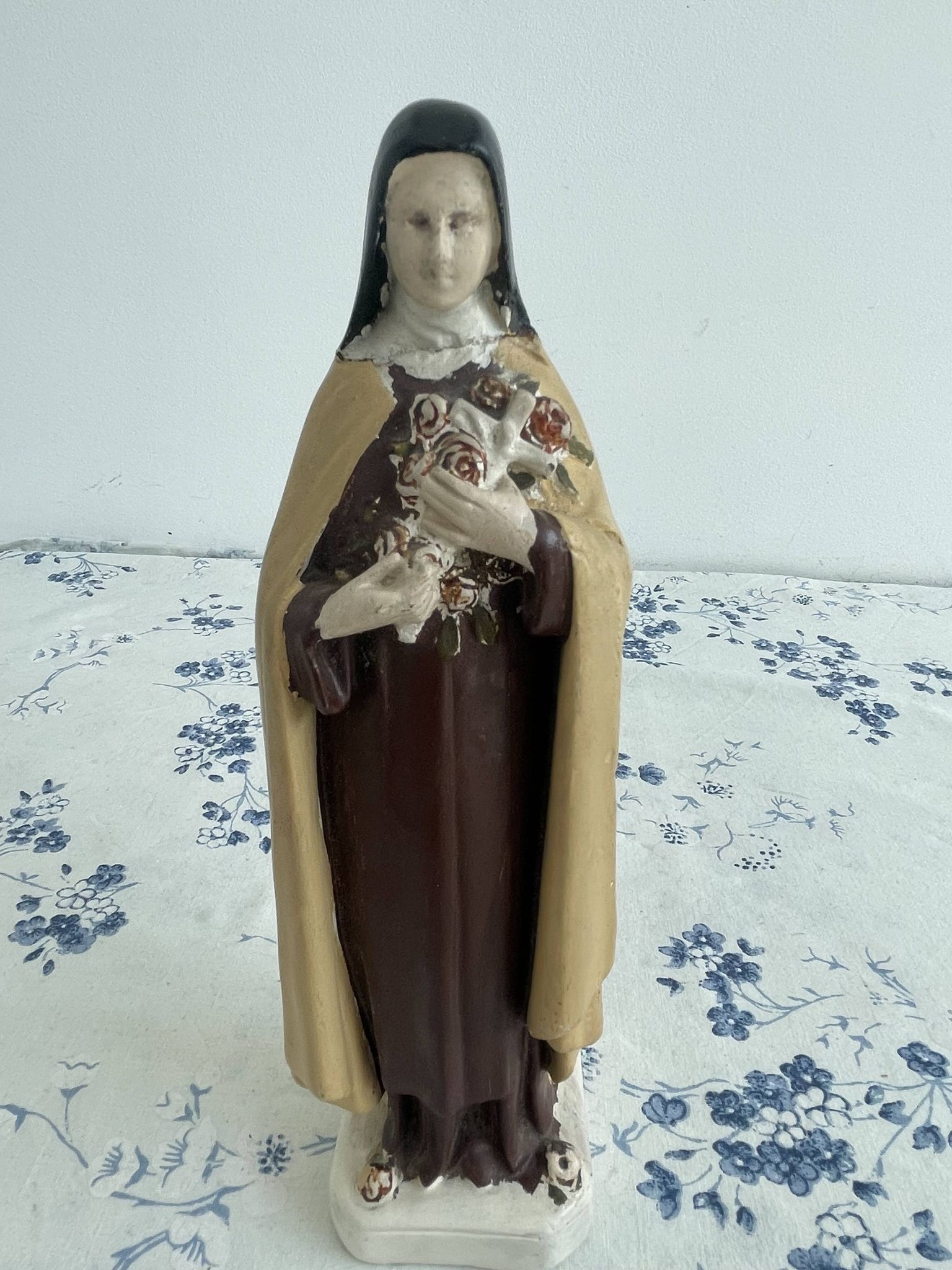 Antique statue of Saint Therese of Lisieux, religious plaster figurine