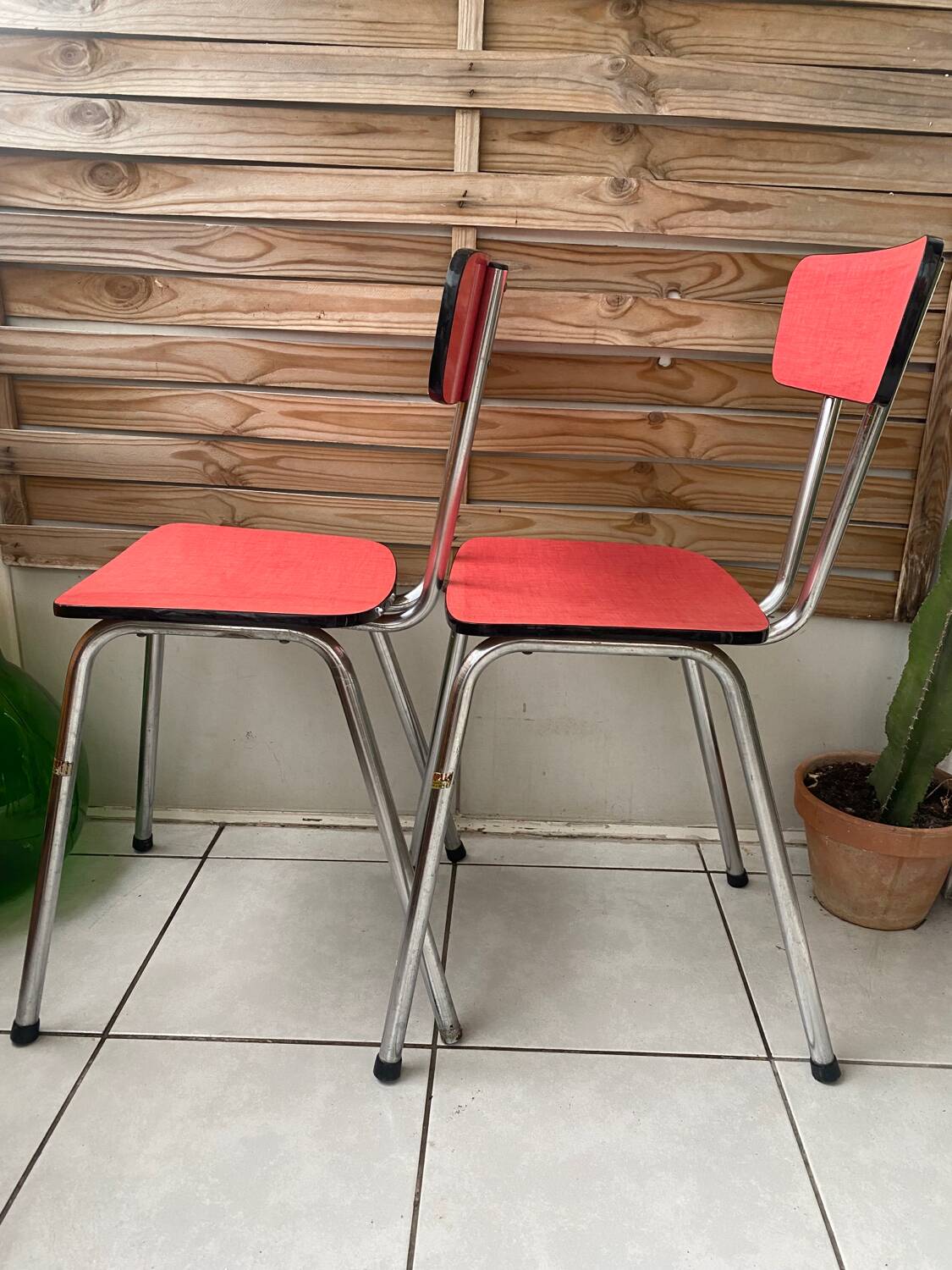 Pair of raspberry formica chairs