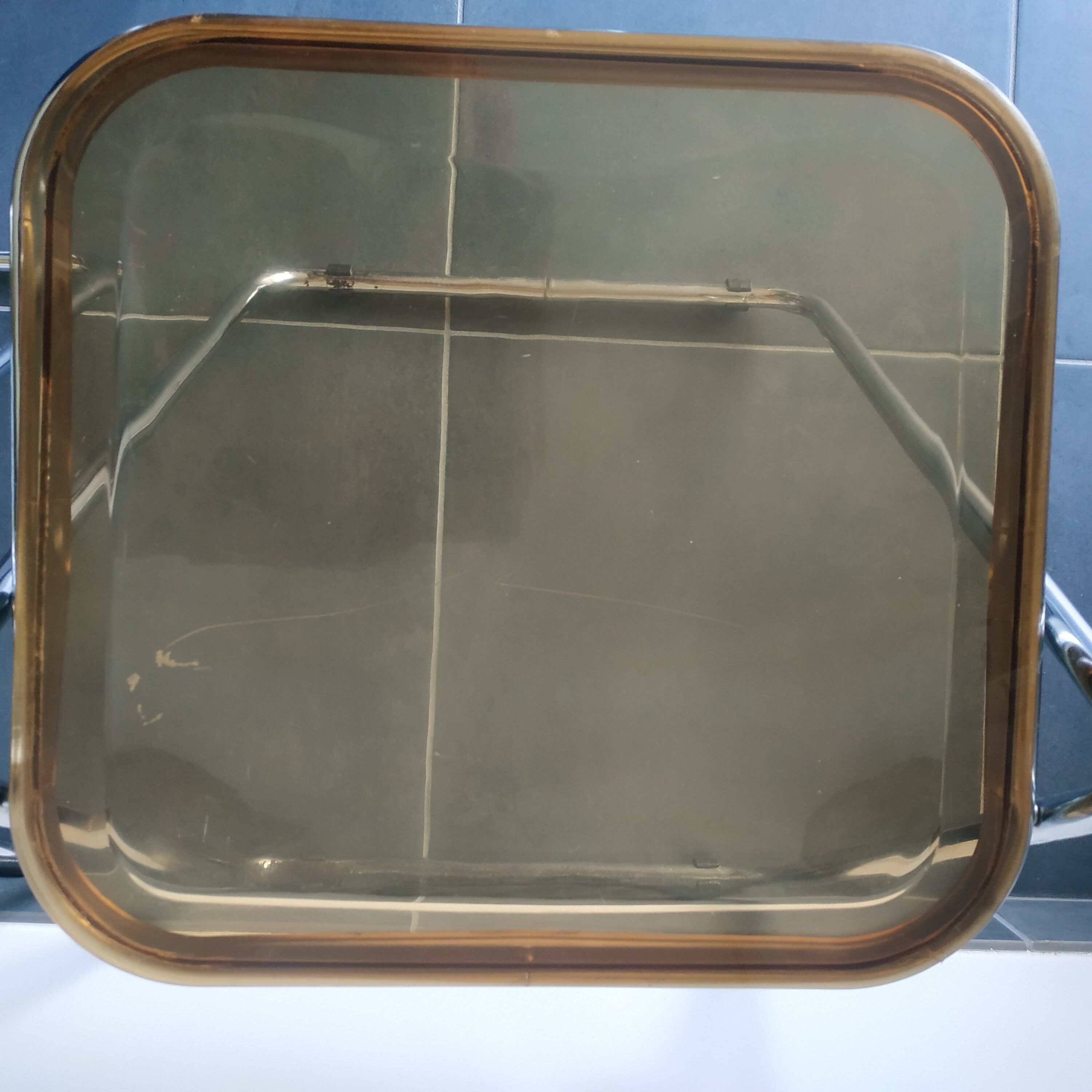 Seventies stainless steel and caramel chairs