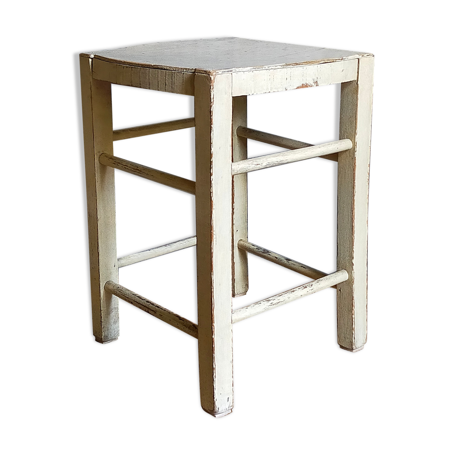 Old patinated painted wooden stool