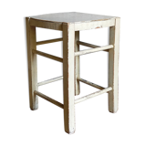 Old patinated painted wooden stool