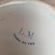 Small antique ironstone jug L.m Creil and Montereau with blue floral decoration.