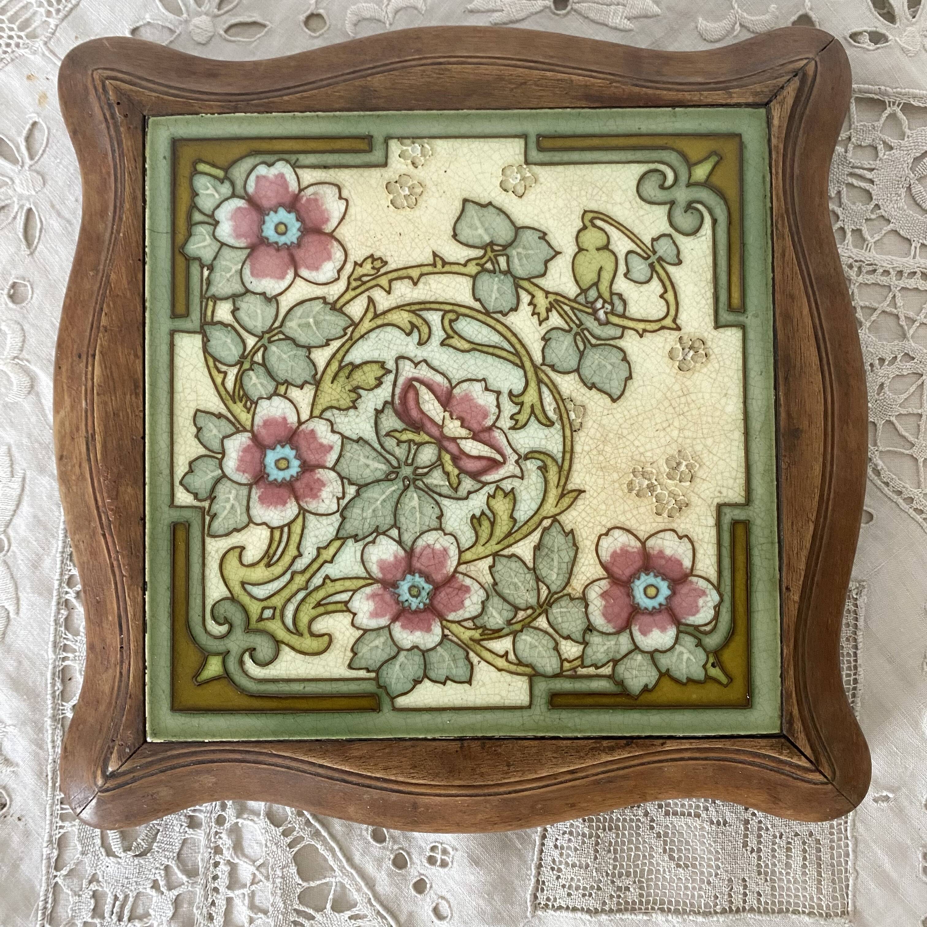 Art Nouveau wood and ceramic trivet