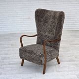 1960s, reupholstered Danish armchair, with stool, genuine sheepskin.