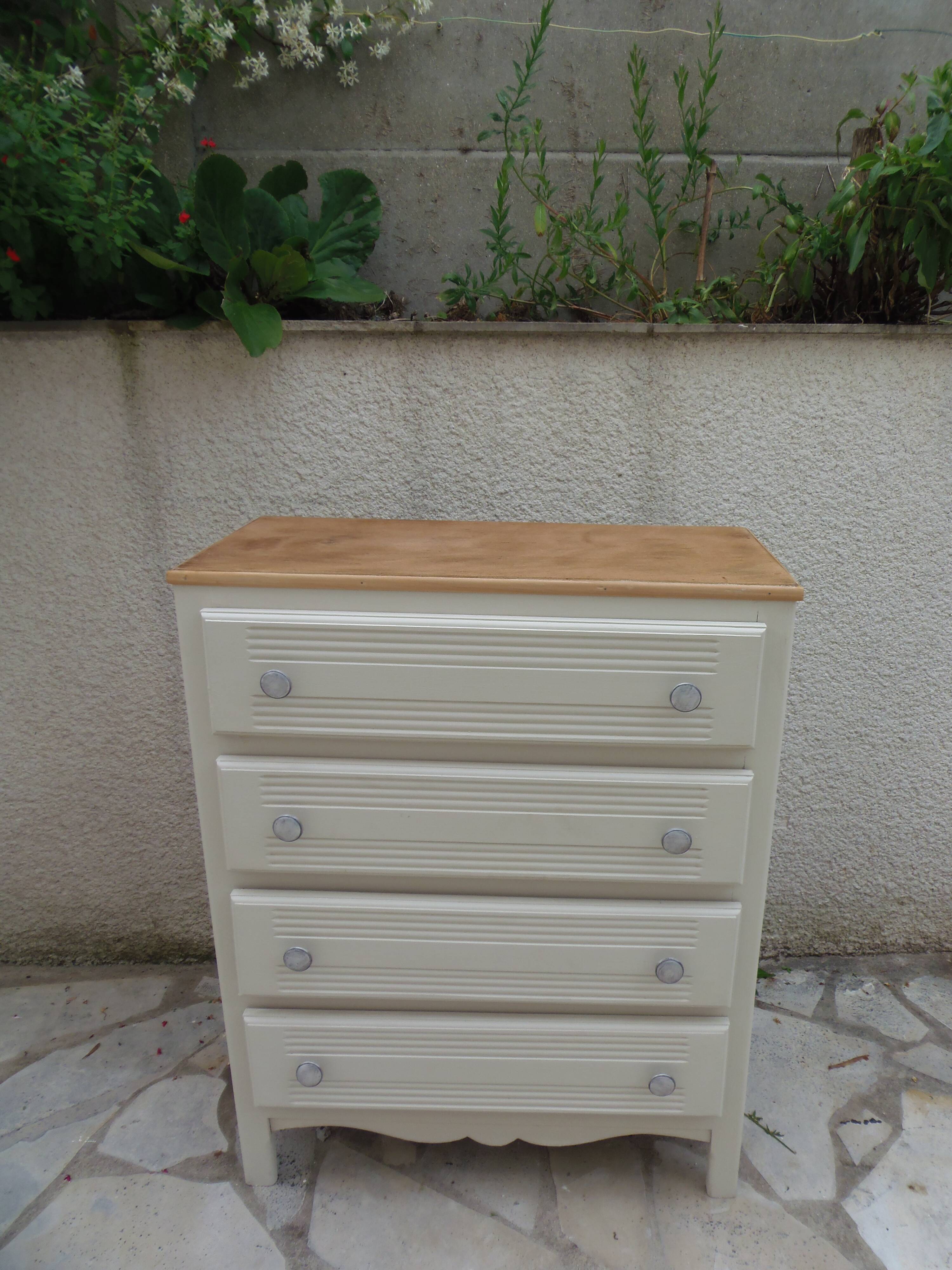 Vintage commode enhanced in beige, wooden top.