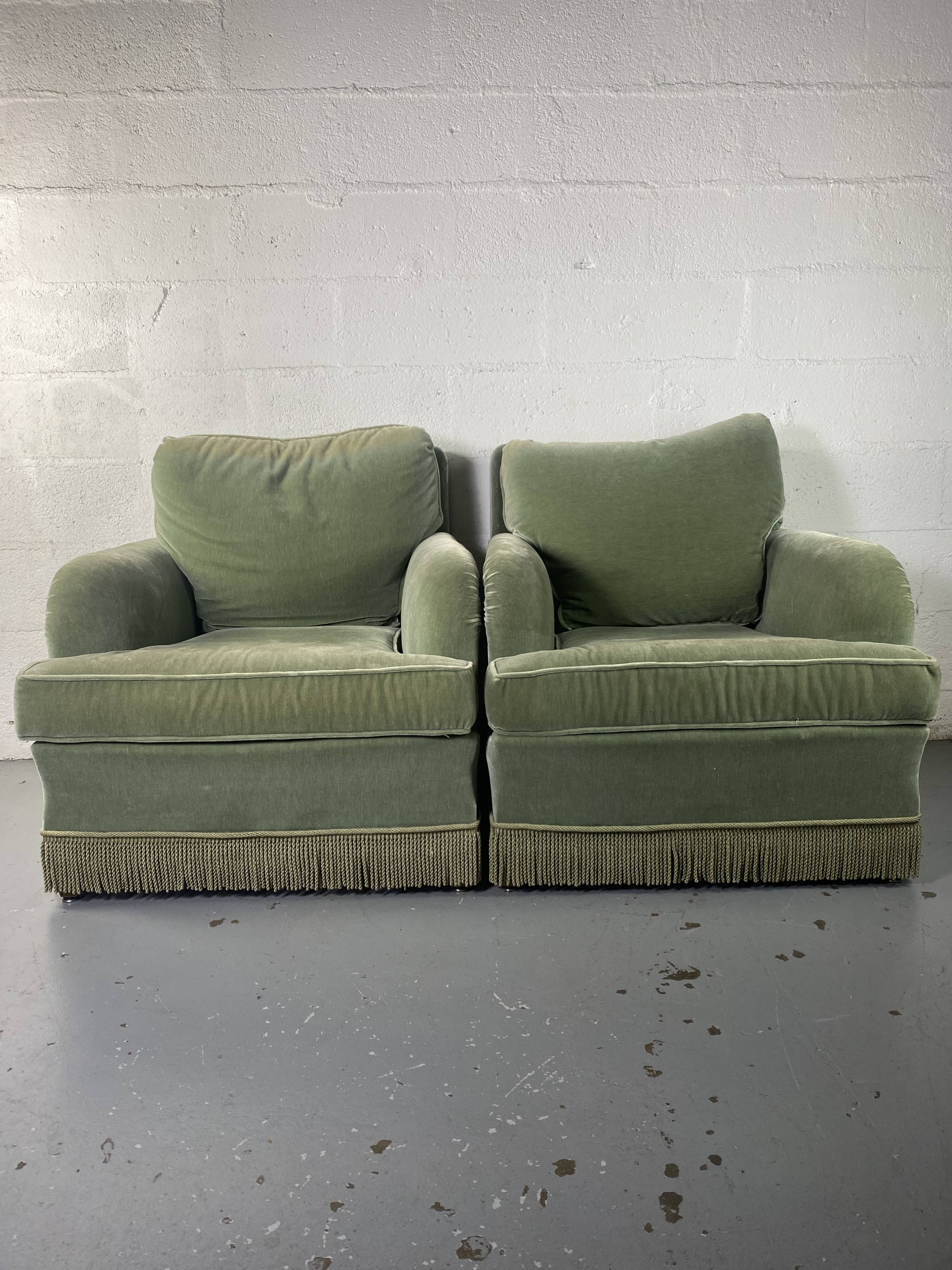Pair of green velvet club armchairs