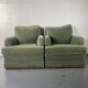 Pair of green velvet club armchairs