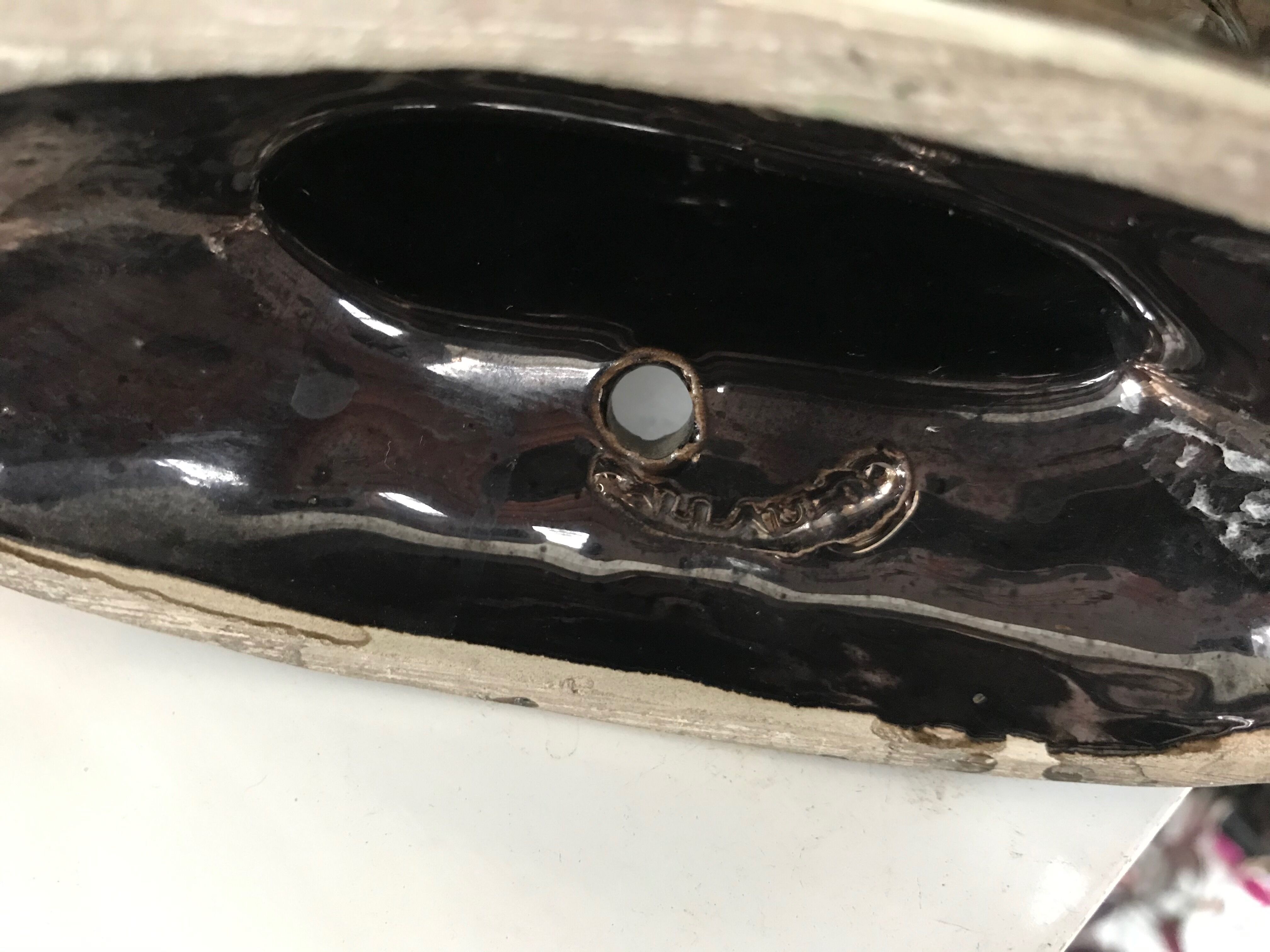 Former black ceramic candlestick signed Vallauris
