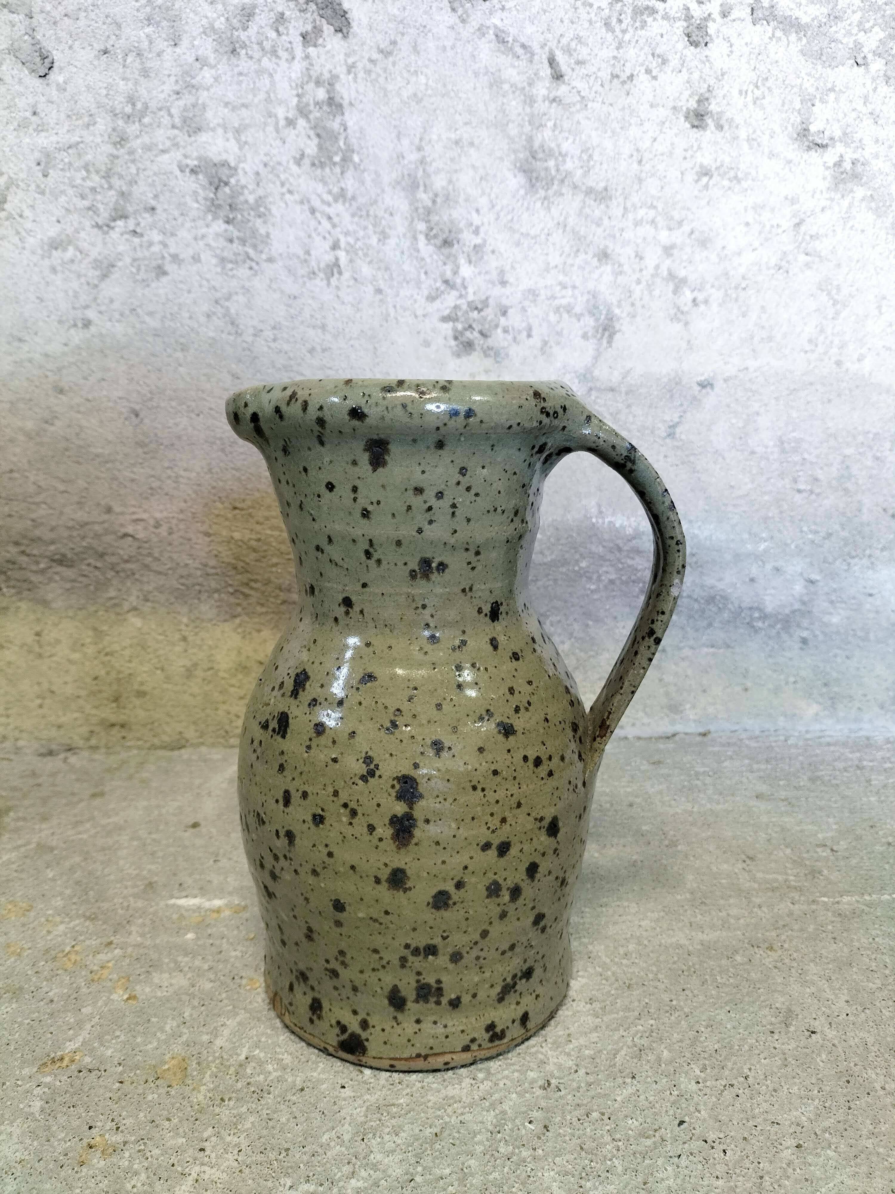 Stoneware pitcher by Gustave Tiffoche