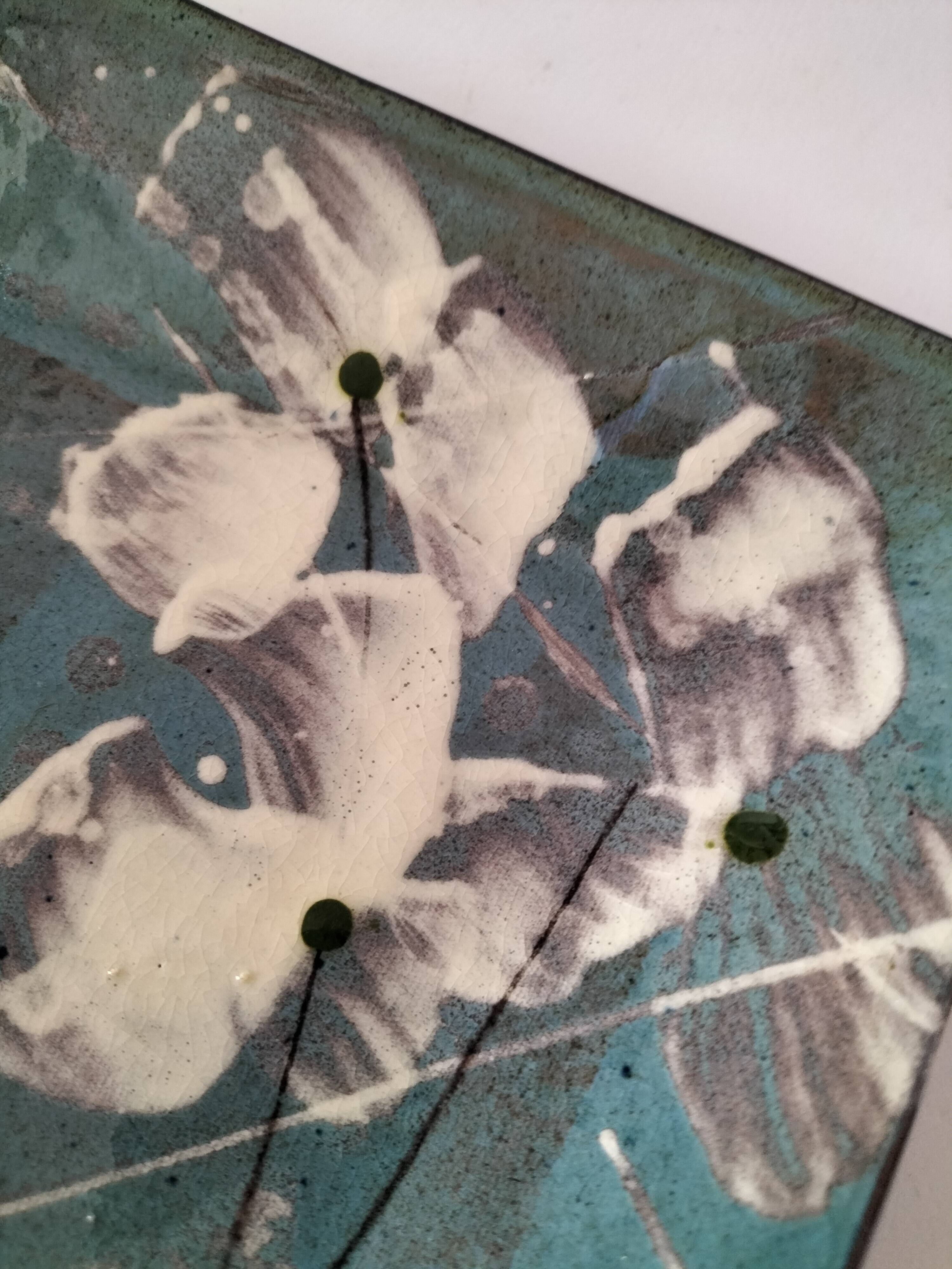 Square turquoise glazed stoneware dish, abstract floral decoration, signed.