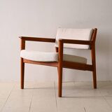 Upholstered armchair with teak frame