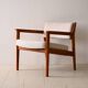 Upholstered armchair with teak frame