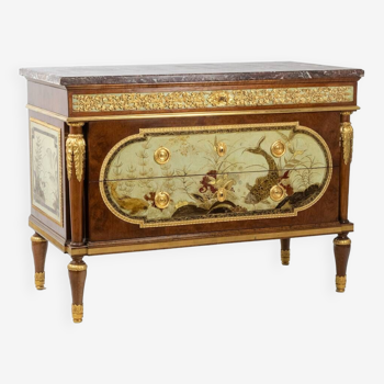 Empire style chest of drawers in lacquer, bronze and marble. Nineteenth century.