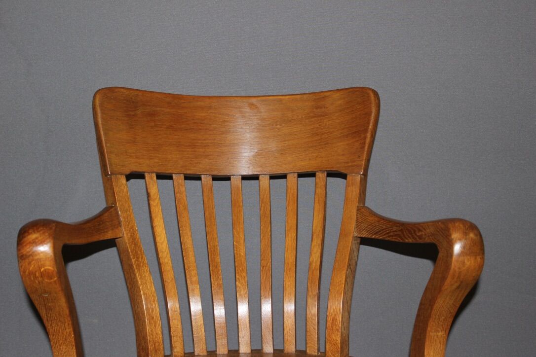 Rotating oak office chair circa 1930