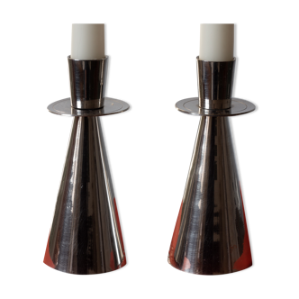 Pair of diabolo candle holders in silver metal