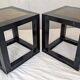 Chinese side tables in black lacquer, stone top.