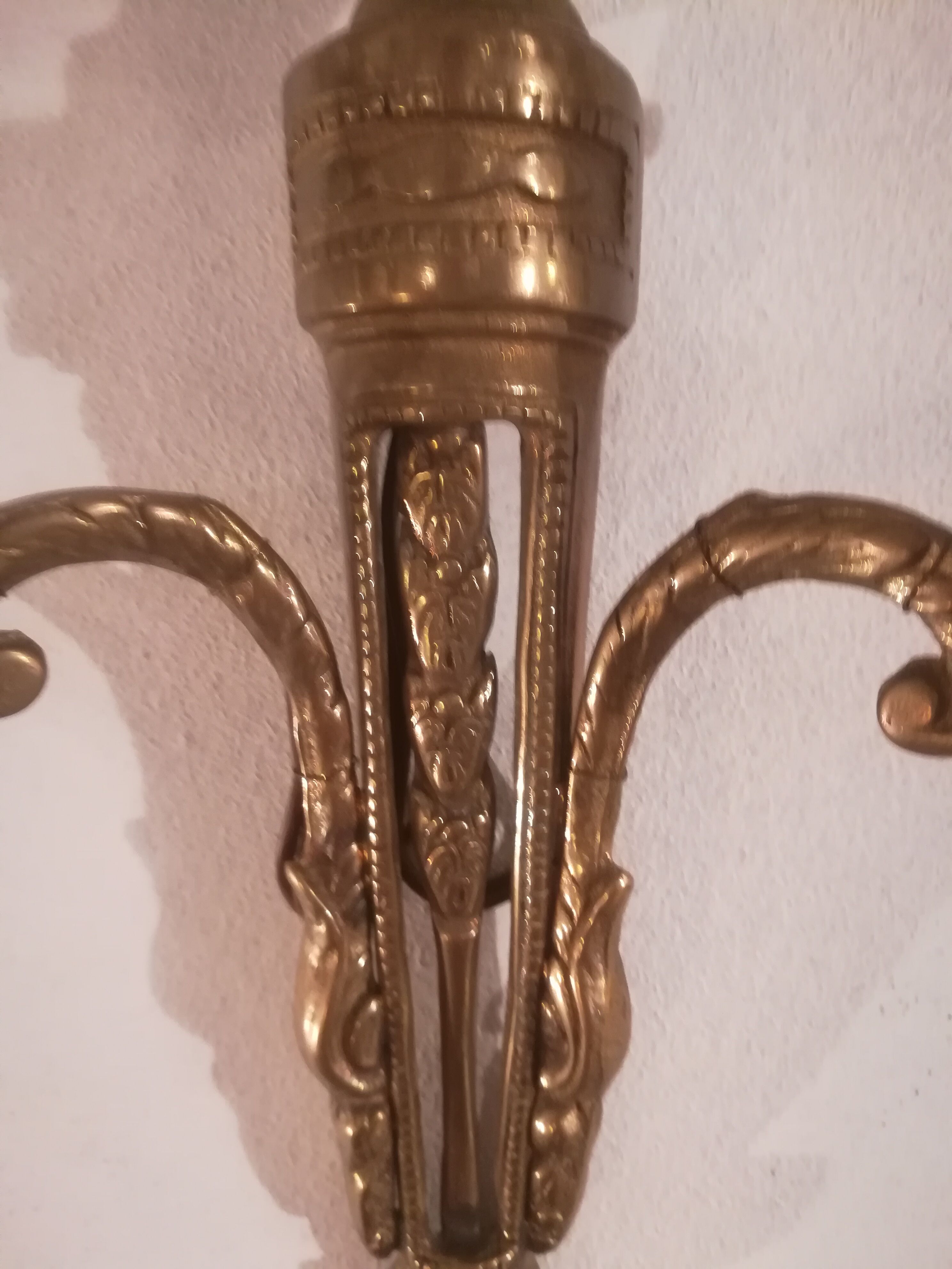 Pair of Louis XVI style sconces in gilded bronze