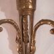 Pair of Louis XVI style sconces in gilded bronze