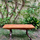 Brutalist bench made of vine and olive wood.