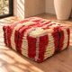 Vintage Moroccan pouf in multicoloured handmade wool.