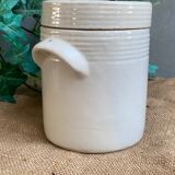 White pot in glazed earth