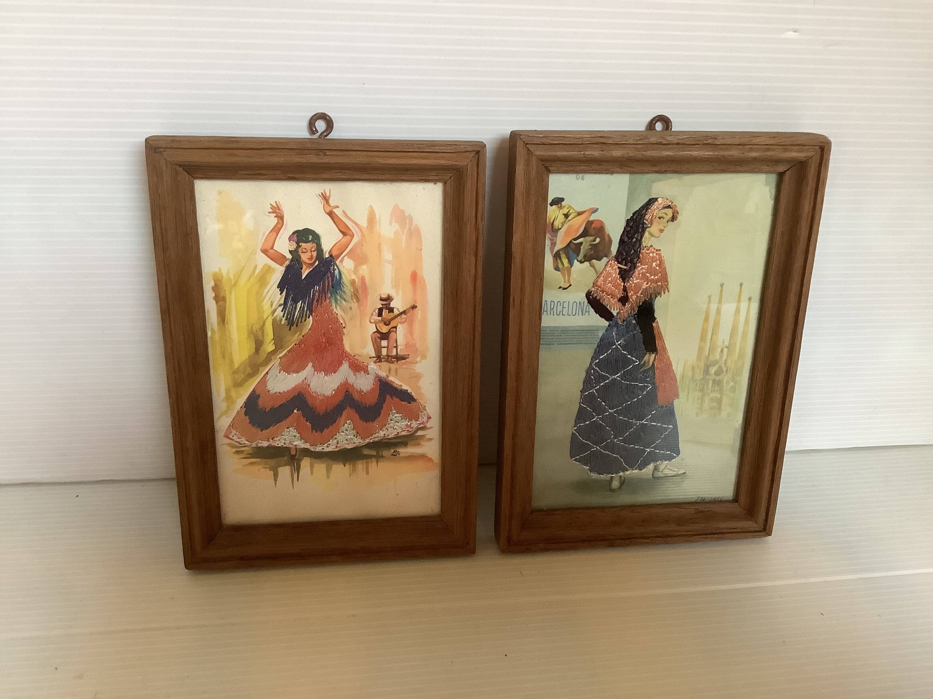 Pair of small frames with Spanish illustrations