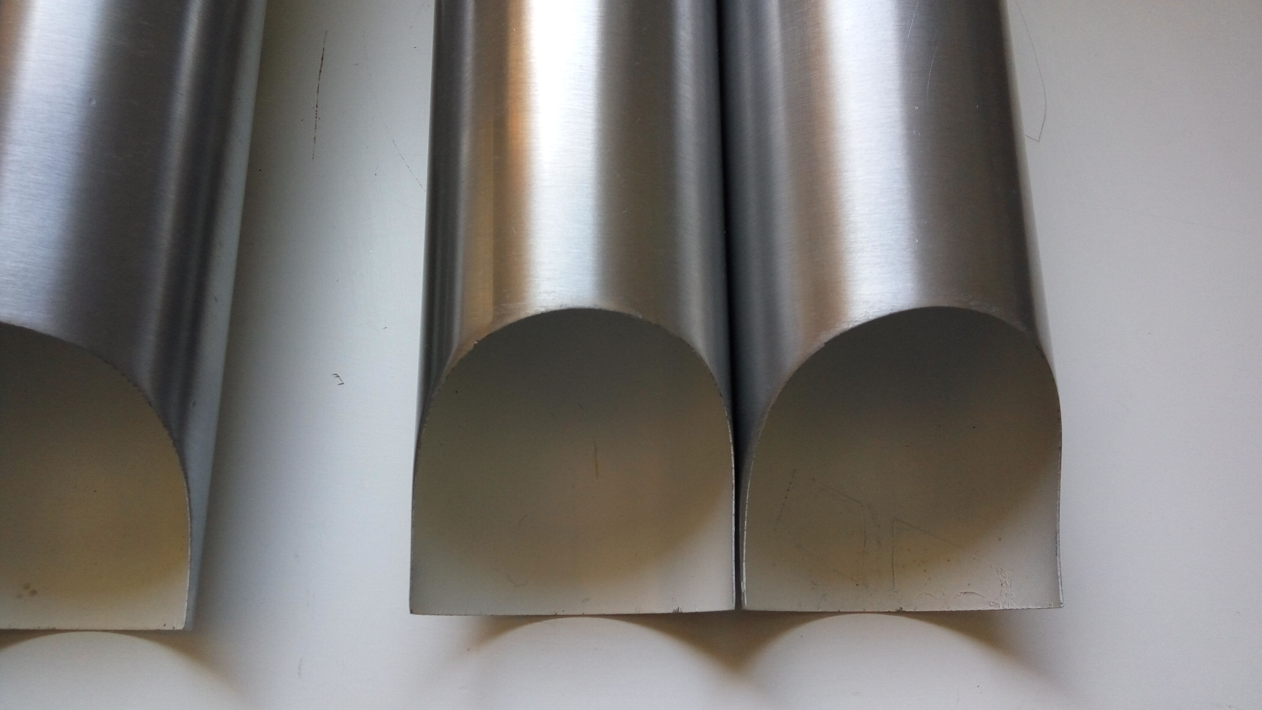 Pair of wall sconces by Fugue Raak