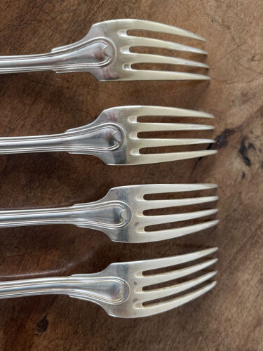 4 fourchettes en métal argenté
