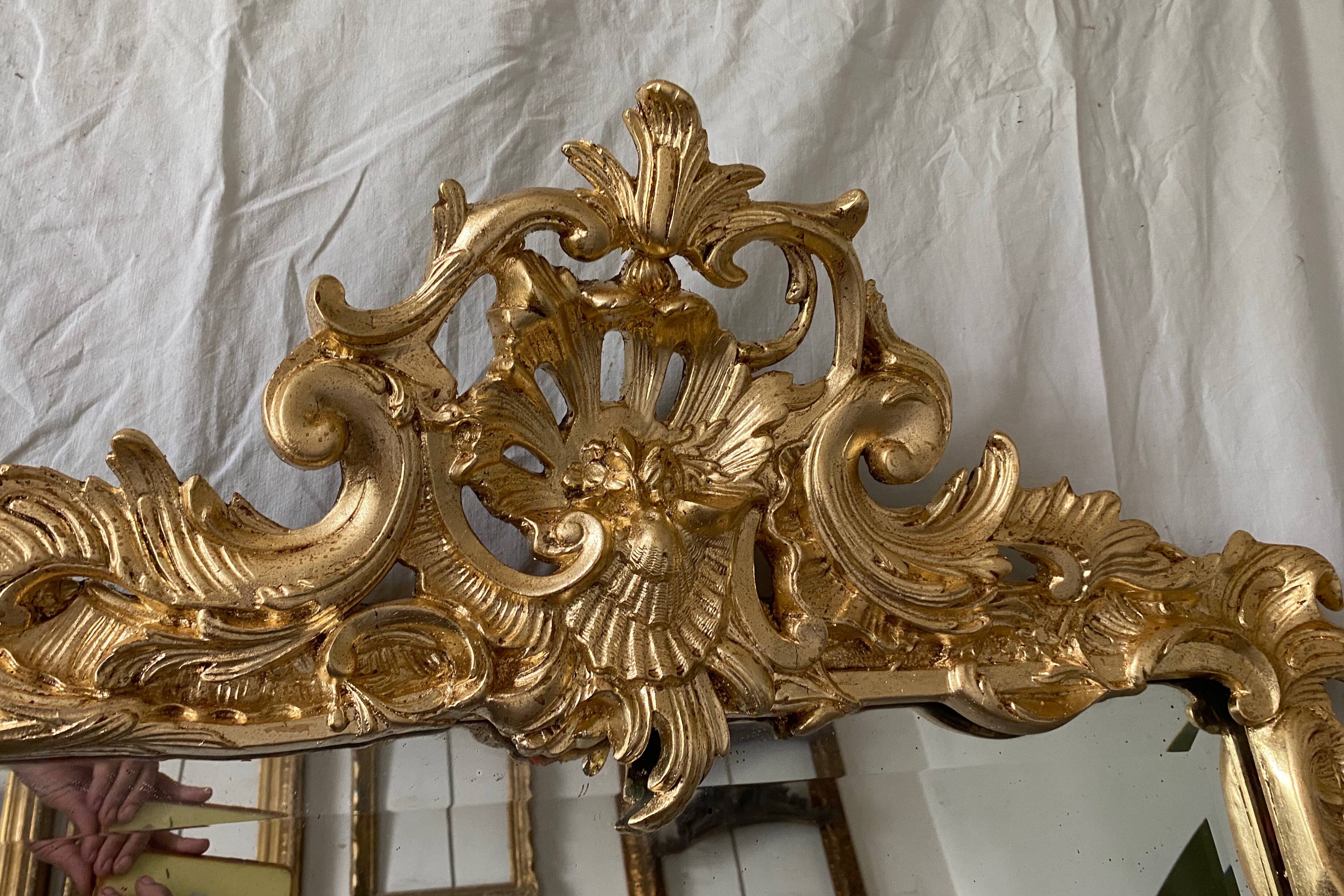 19th century gilded mirror with pediment
