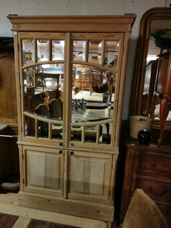 Cabinet with beveled mirrors and aero gummed