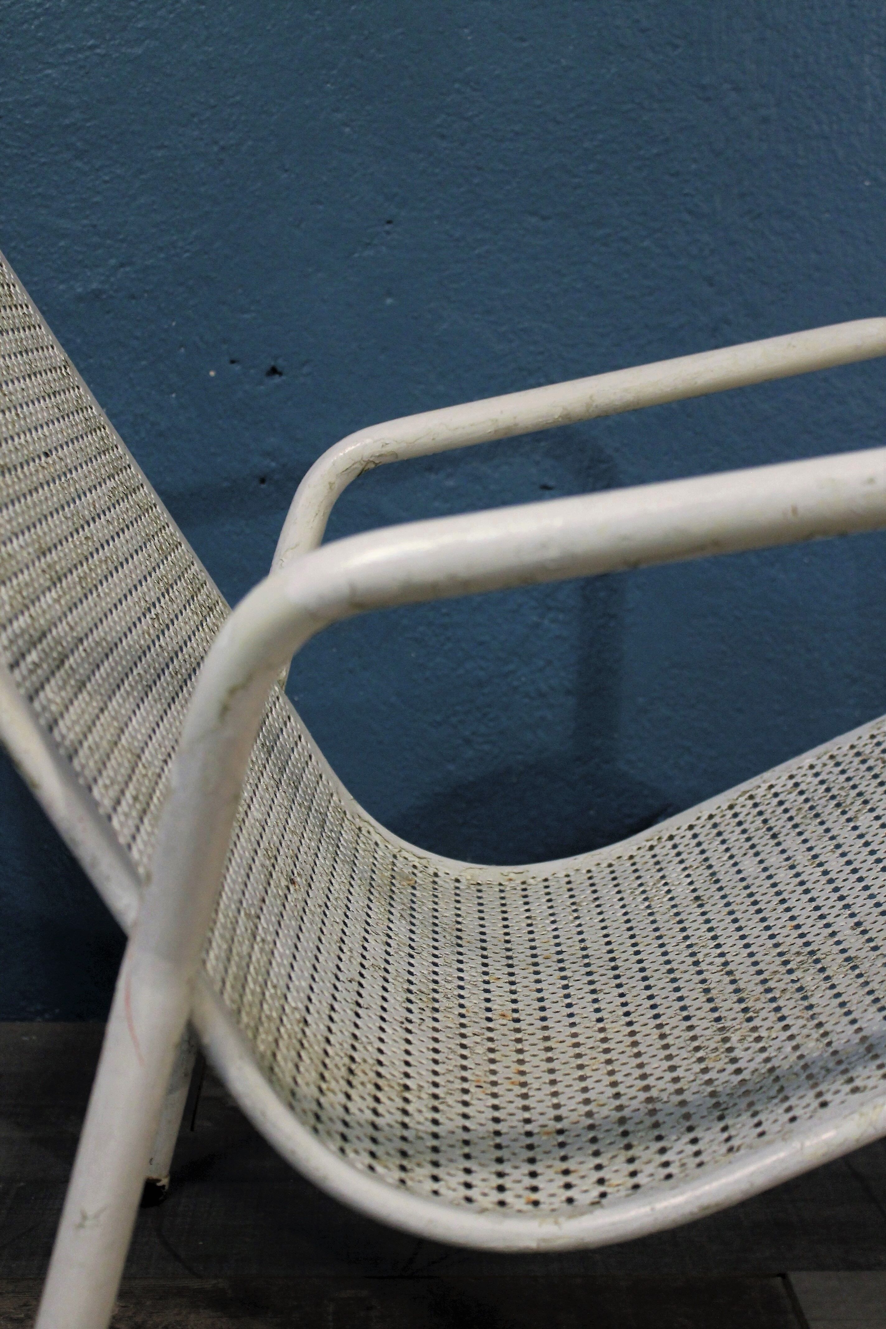 1960 perforated metal garden armchairs