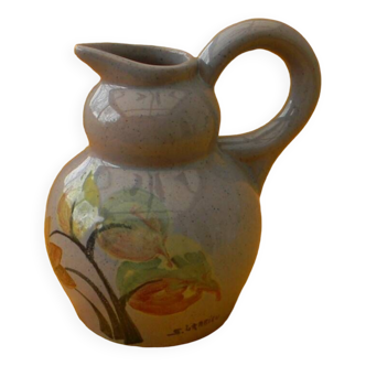 Ceramic pitcher by simone larrieu.