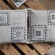 Pair of gray Berber Kerkennah cushions