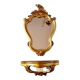 Miroir mural et console dorés de style baroque