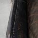 Set of 2 black cow leather armchairs finished with decorative nails, industrial style