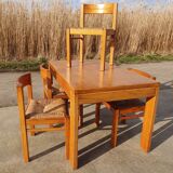 Set vintage pine dining table with 4 rush seat chairs Dutch design
