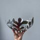Designer metal fruit bowl