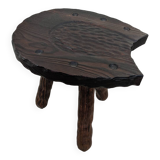 Tripod stool, horseshoe, rustic brutalist decoration.