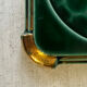 Art Deco bottle coaster in speckled green glazed ceramic and