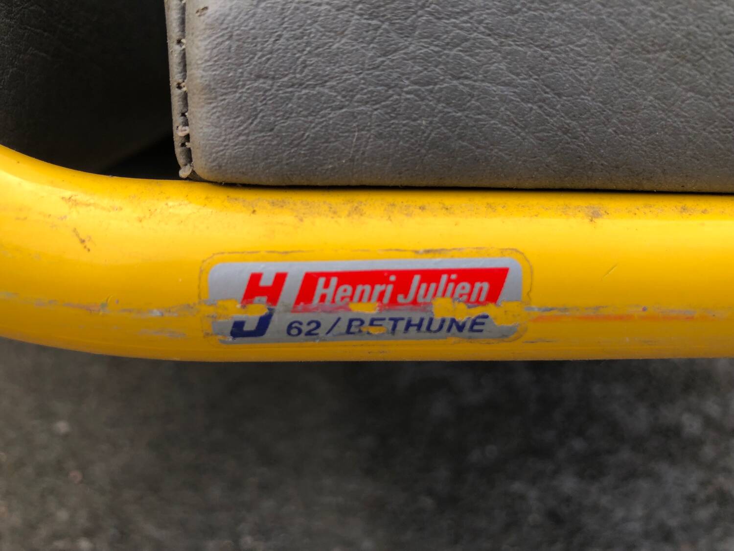 Pair of designer armchairs by Henri Julien