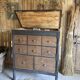 Old workshop drawer unit with a folding top.