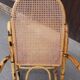 Rocking-chair en rotin et cannage vintage