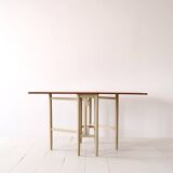 Vintage table with folding wings