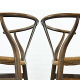 Pair of CH24 wishbone dining chairs by Hans Wegner for Carl Hansen Denmark